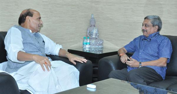 The Union Minister for Defence, Manohar Parrikar calling on the Union Home Minister, Rajnath Singh, in New Delhi