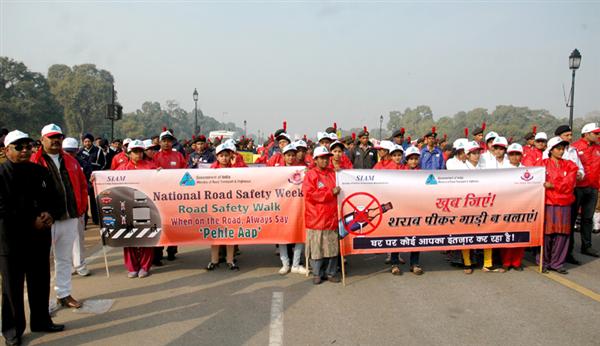 Students holding banners at the “Road Safety Walk” for involving youth, school and college students and all stakeholders including Police, Transport Departments and others to work together to raise awareness about road safety issues, organised by the Ministry of Road Transport and Highways, in New Delhi