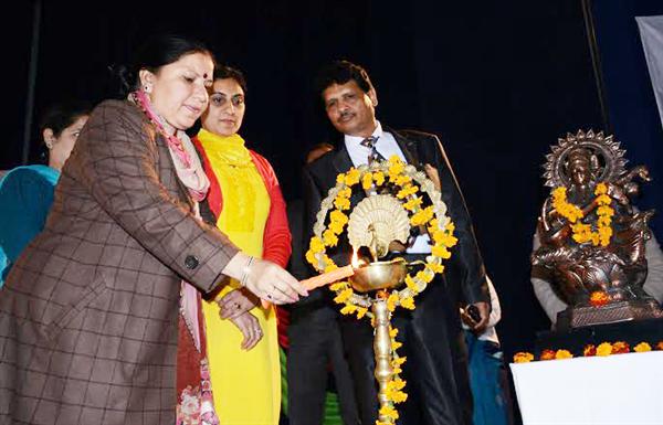 Haryana Education Minister Geeta Bhukkal lighting the lamp to mark the beginning of national seminar on Life Skills and Youth Development at Panchkula 