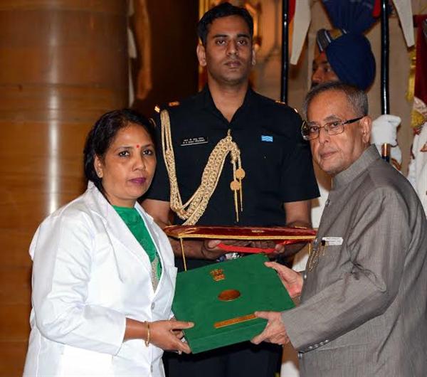 Hon’ble President of India, Mr. Pranab Mukherjee confers the National Florence Nightingale Award-2014 on Mrs. Kailash R.M., Nursing Sister, Government Multi Specialty Hospital, Sector-16, Chandigarh at Rashtrapati Bhavan.